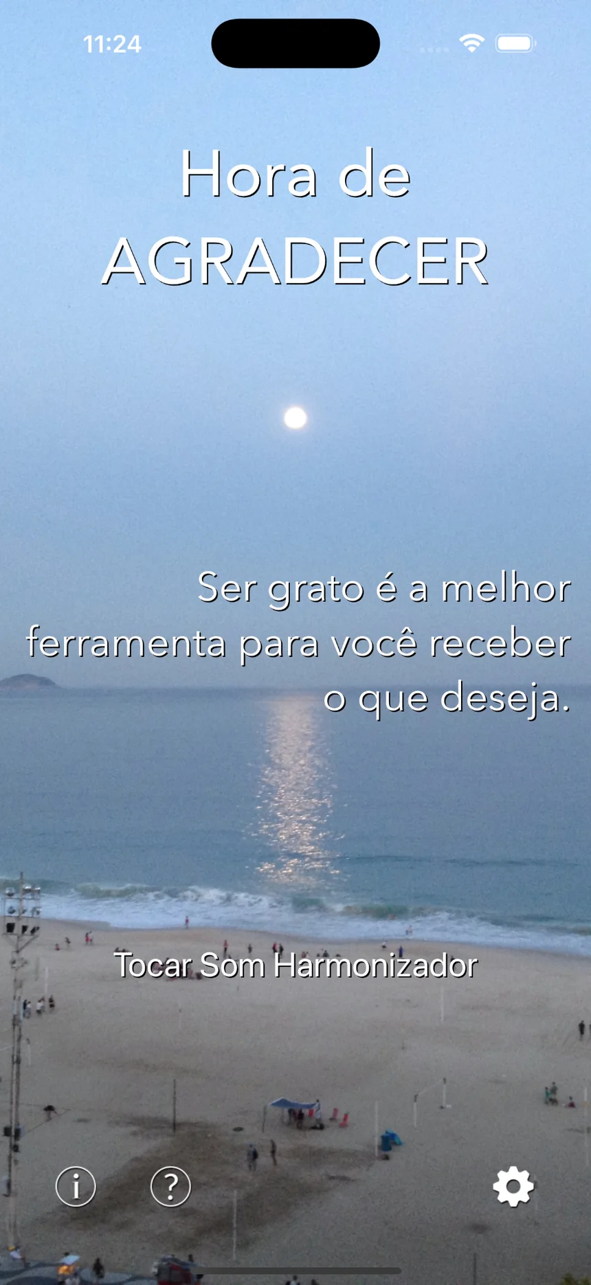 Tela principal do Hora de Agradecer com paisagem à beira-mar e acesso ao Som Harmonizador